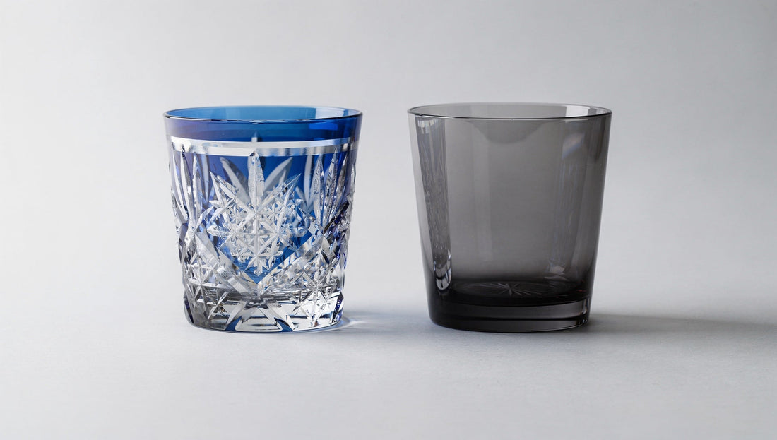 A cobalt overlay cut glass beside a fully smoke-tinted glass, showing cut-to-clear versus through-wall tint.