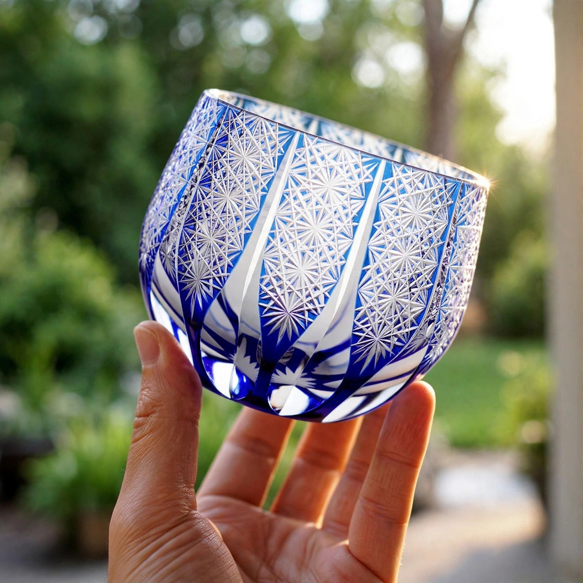 Cobalt Chrysanthemum Sake Glass, hand held proof of use