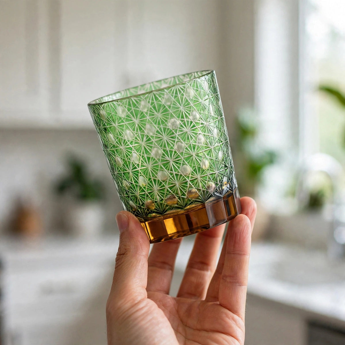 Pine Chrysanthemum Whisky Glass, hand held proof of use