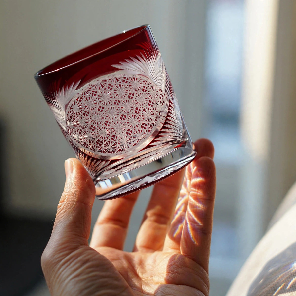 Ruby Feather Whisky Glass, hand held proof of use