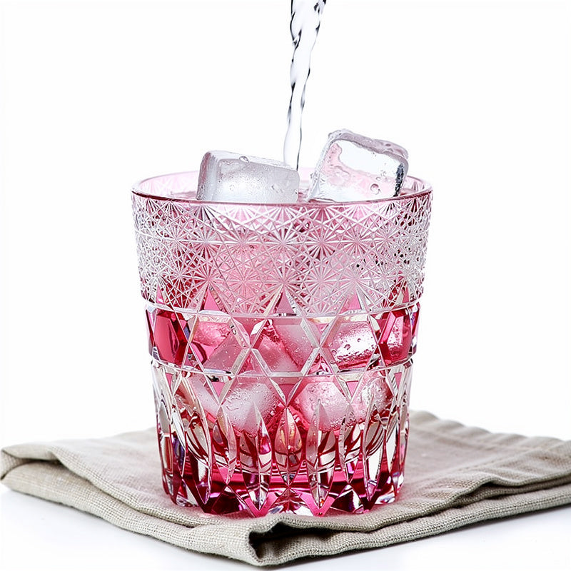 Ruby Night Water Whiskey Glass, shown with a whisky pour