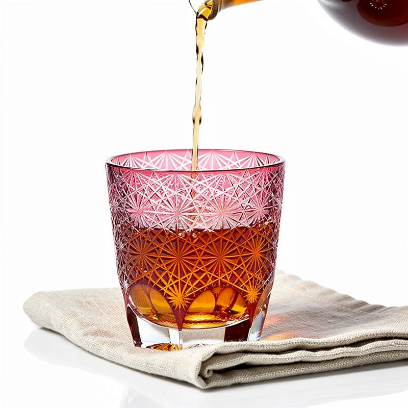 Ruby Rim Light Whiskey Glass shown with a whisky pour
